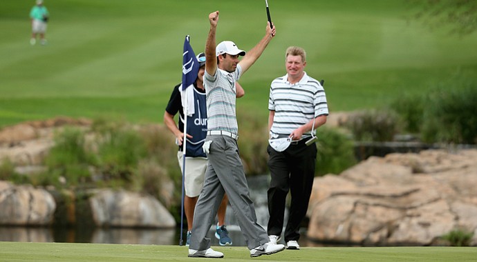 Charl Schwartzel celebrates after winning the Alfred Dunhill Championship.