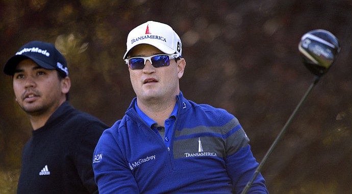 Zach Johnson, right, alongside Jason Day during the first round of the 2013 Northwestern Mutual World Challenge.