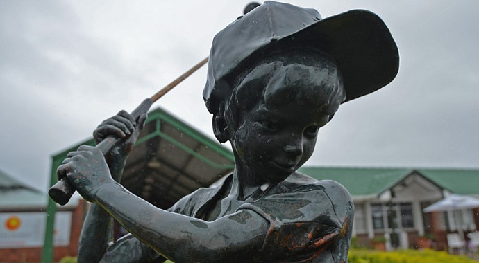 A statue of a child playing golf stands at the 2013 Nelson Mandela Championship, which benefits the Nelson Mandela Children's Fund.