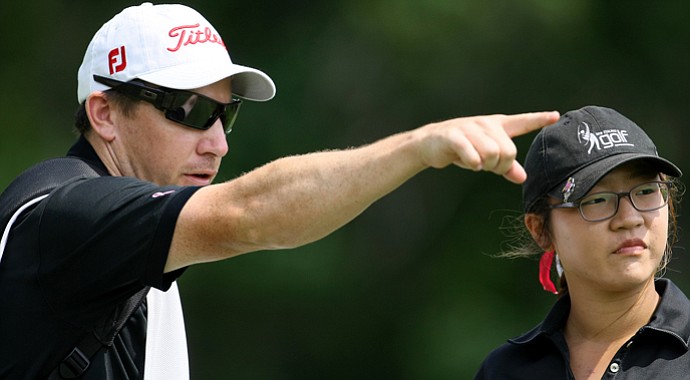 Lydia Ko with then-coach and caddie Guy Wilson during the 2011 U.S. Women's Amateur.