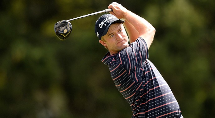 Russell Knox hits his tee shot on the eighth hole during the first round of the Hotel Fitness Championship.
