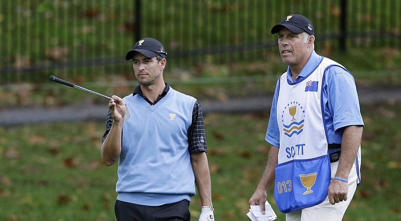 Caddie Steve Williams will not work with Adam Scott during the 2014 Sony Open in Hawaii (shown during last year's Presidents Cup).