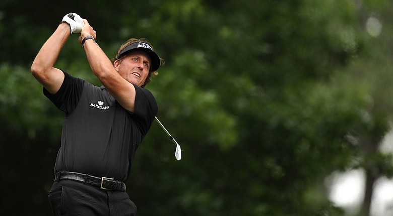 Phil Mickelson tees off on the fourth hole during the second round of the 76th Masters golf tournament at Augusta National.