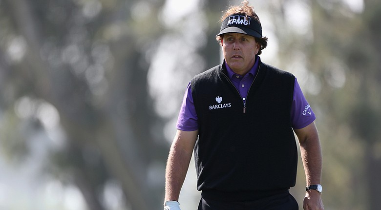 Phil Mickelson dealt with muscle pain in his lower back at the Farmers Insurance Open. He withdrew from the event on Friday night.