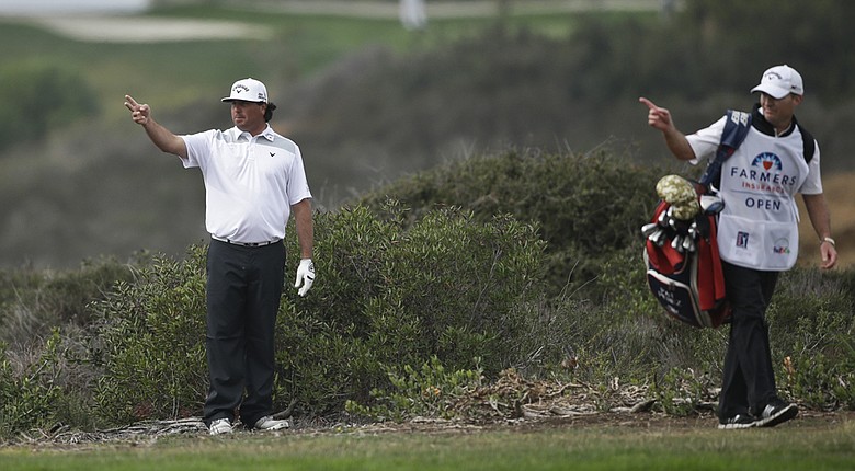 Pat Perez and caddie Mike Hartford during the PGA Tour's 2014 Farmers Insurance Open.