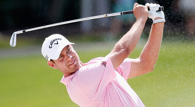 Harris English shot 3-under 69 to take the clubhouse lead Thursday at the WGC-Cadillac Championship.