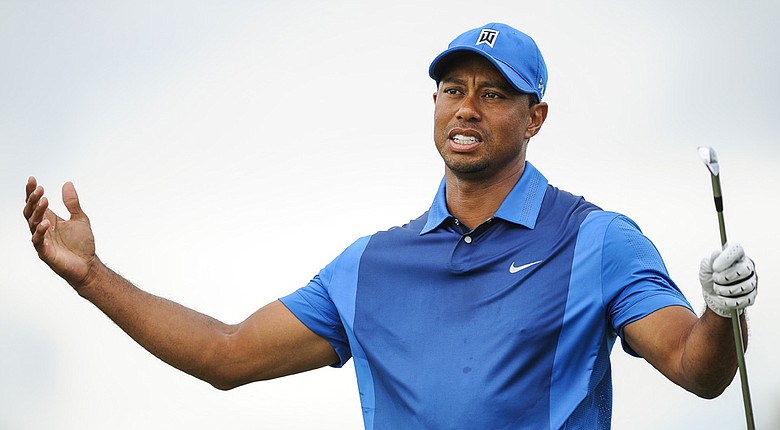Tiger Woods was 2 over through 10 holes before play was suspended Thursday at the WGC-Cadillac Championship.