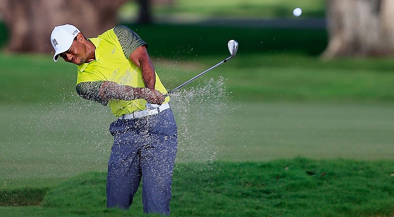 Tiger Woods during the completion of his first round Friday at the WGC-Cadillac Championship at Trump National Doral.