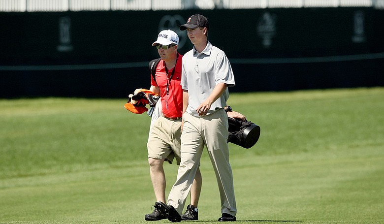 Oklahoma State's Zachary Olsen and his caddie/father Brad Olsen, walk up No. 9 at Bay Hill Club & Lodge for the Arnold Palmer Invitational.