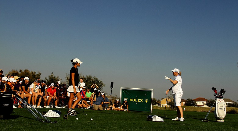 Jaye Marie Green hits balls in 2011 with Annika Sorenstam, who was 5 months pregnant at the time, during The Annika Clinic at the Annika Academy at Reunion Resort.