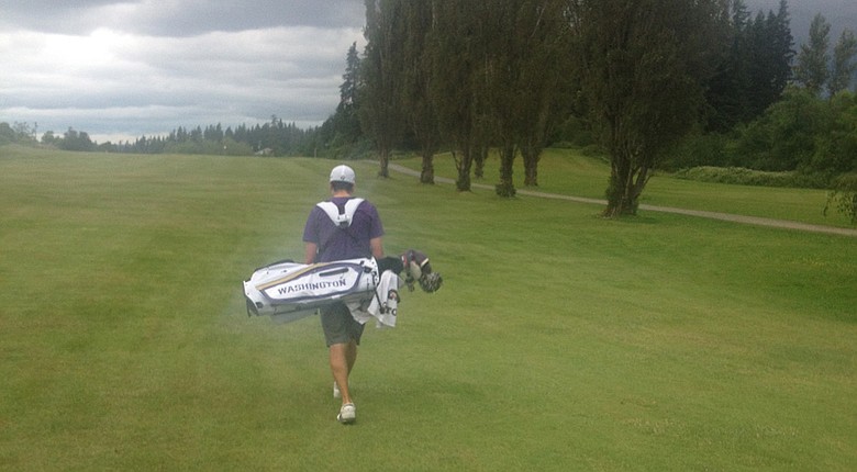 Tyler Salsbury walking Enumclaw Golf Course during his 13-under 57 round on June 19.
