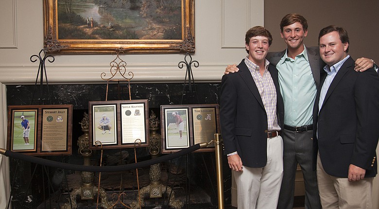 LSU teammates Stewart Jolly (from left) and Smylie Kaufman and Alabama's Tom Lovelady pose with commemorative plaques presented by the club Monday night in the Vestavia Hills section of Birmingham.