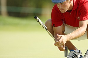 Bryson DeChambeau lines up his putt during the finals of the U.S. Amateur at Olympia Fields (Ill.) Country Club.