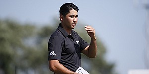 Storms suspend play with Day shooting for 59 at BMW