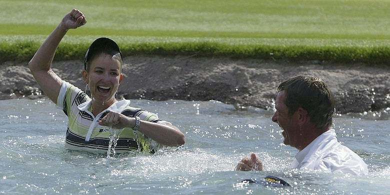 Karrie Webb and Mike Paterson after Webb's 2006 Kraft Nabisco Championship win